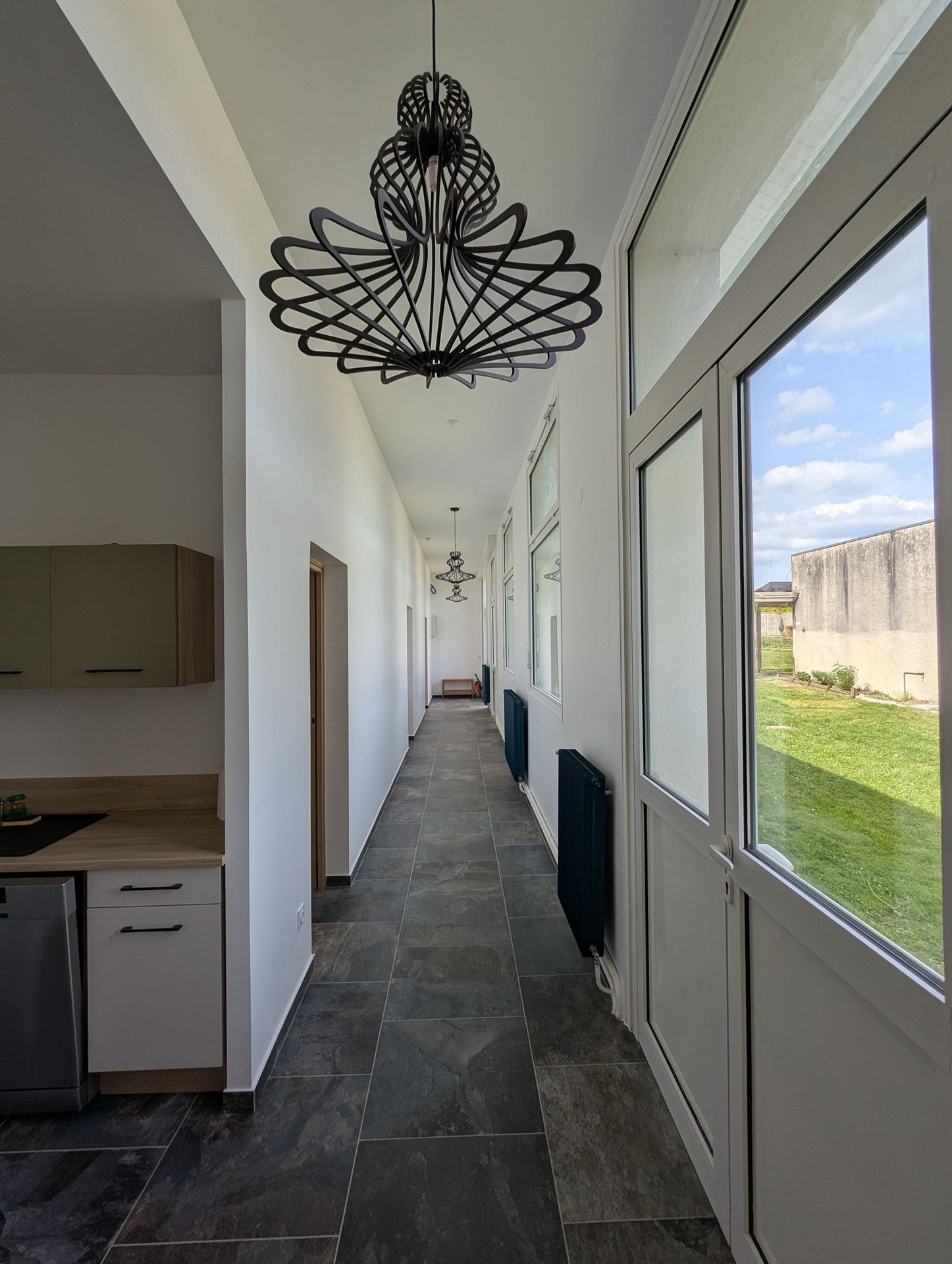 Couloir avec des suspensions RIF Luminaires